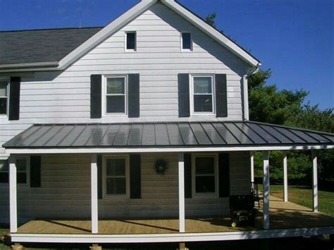 how to use metal roofing over deck from house|build overhang roof over deck.